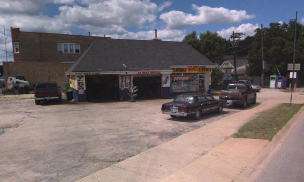 Leased auto-repair shop managed by Millennium Properties