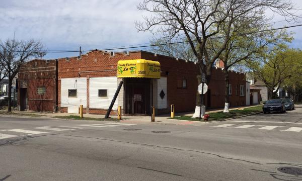 Brighton Park mixed-use building with bar and apartments