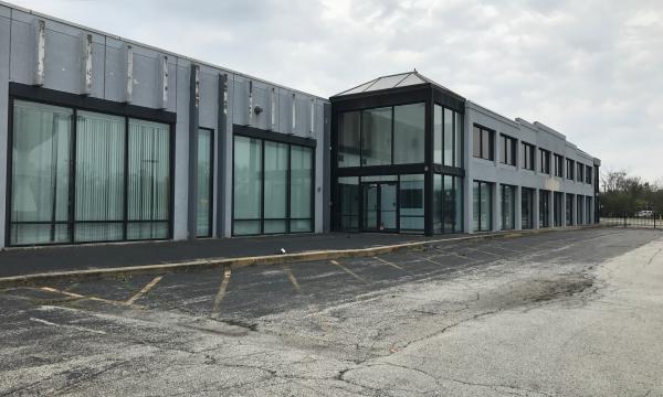 Flex building adjacent to Metra for rehab or redevelopment